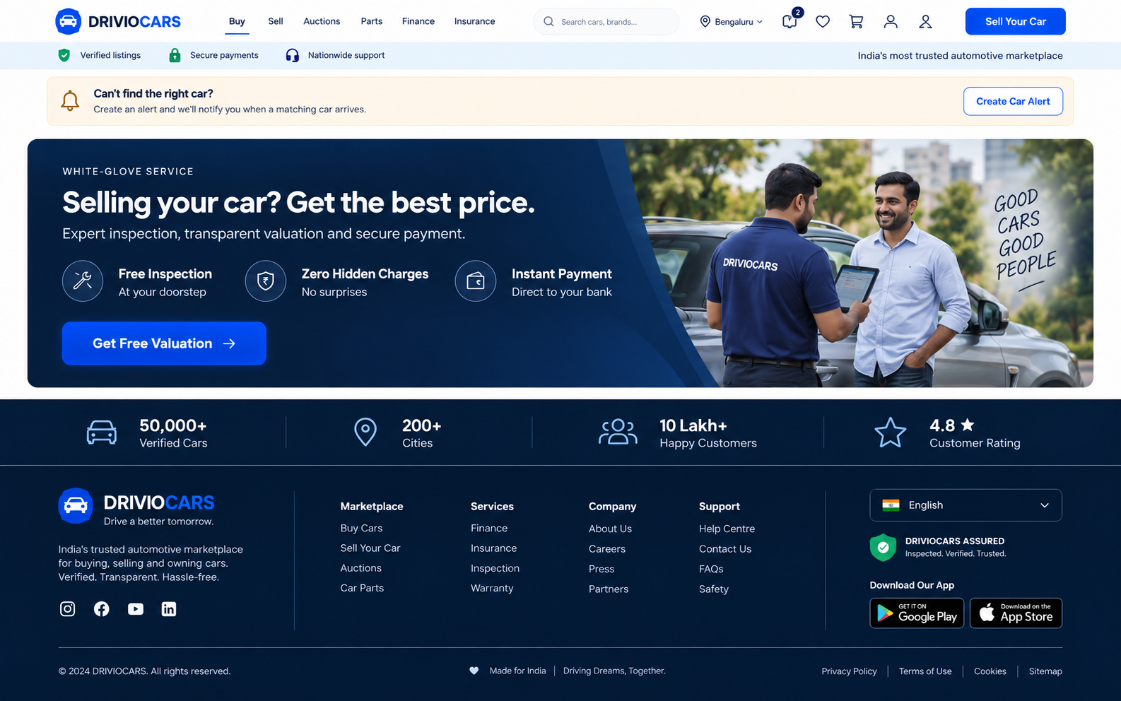 A DrivioCars specialist helping a car owner with an inspection